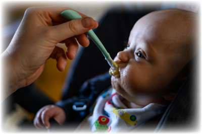 baby-eating-baby-food.jpg
